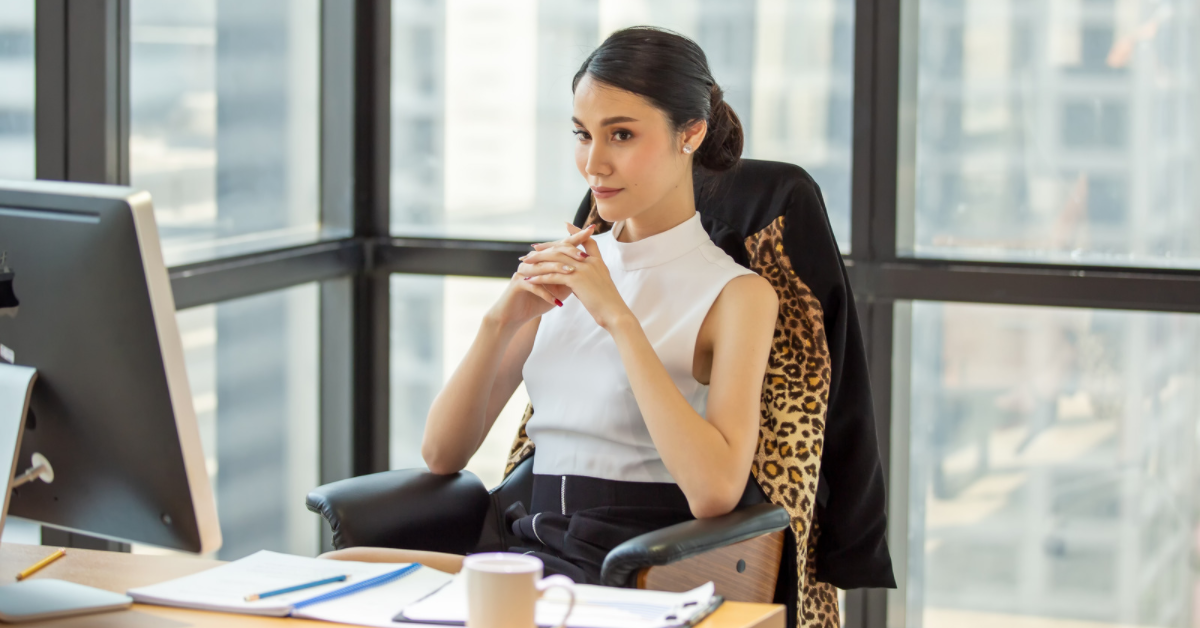 banner woman seriously thinking at desk