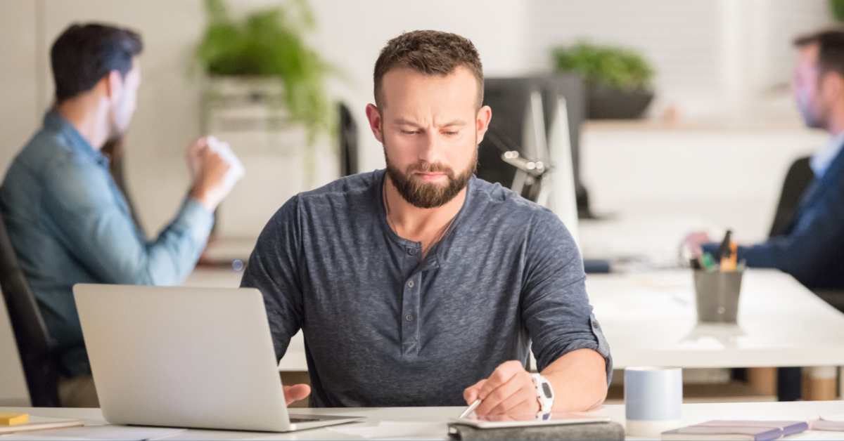 man working at desk